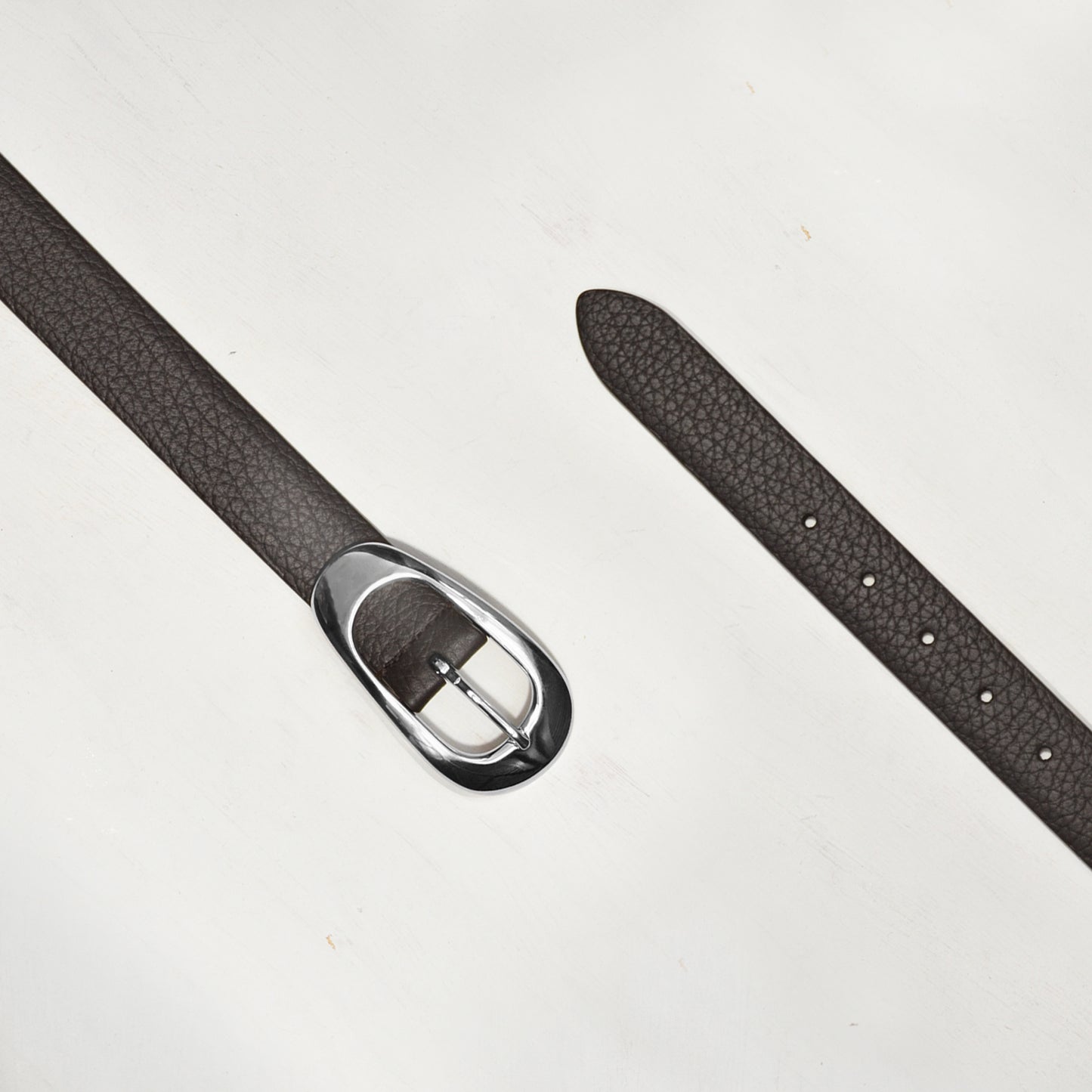 CHOCOLATE BELT W IRREGULAR SILVER OVAL BUCKLE W PEBBLE EMBOSSED LEATHER