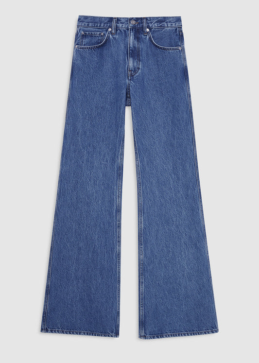 Blue jeans on a light gray background