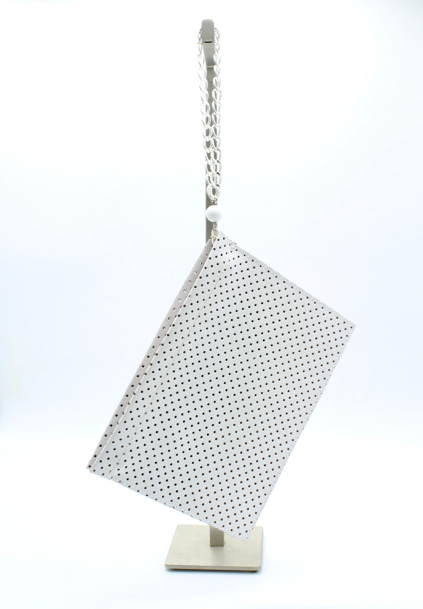 THE CLUTCH LEATHER CLUTCH WHITE W DOTS LASER CUT
