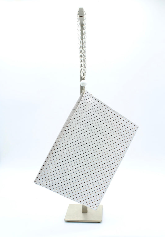 THE CLUTCH LEATHER CLUTCH WHITE W DOTS LASER CUT