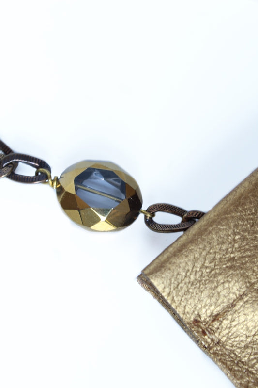 "THE CLUTCH" IN GOLD LEATHER