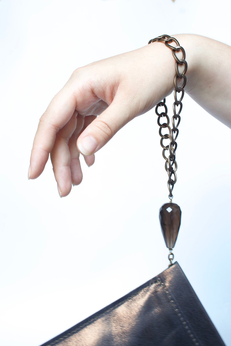 "THE CLUTCH" IN BRONZE LEATHER