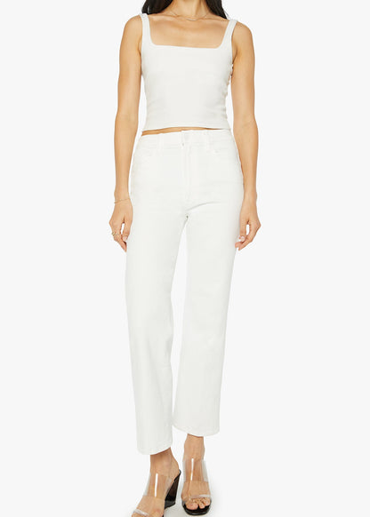 Person wearing a white sleeveless top and pants on a white background