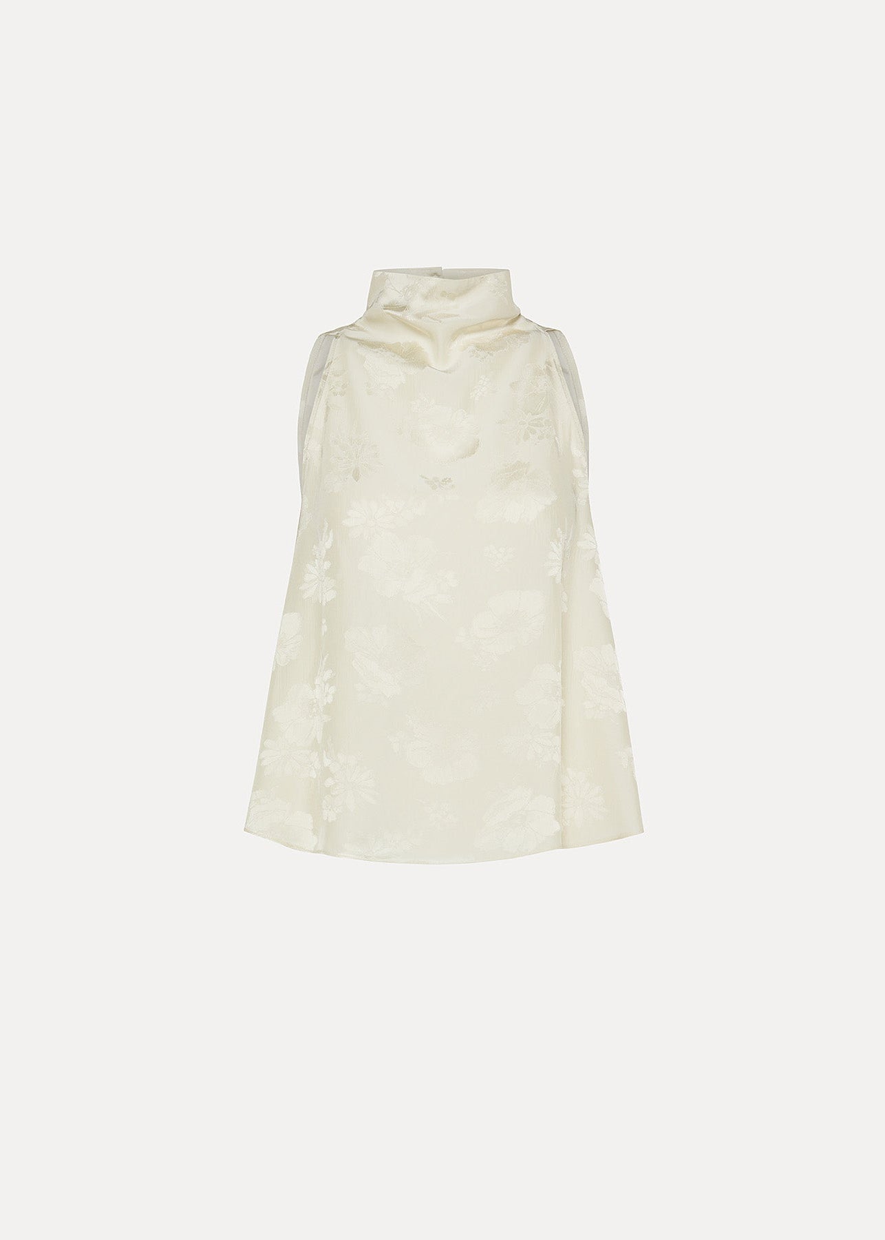 White sleeveless dress on a light beige background