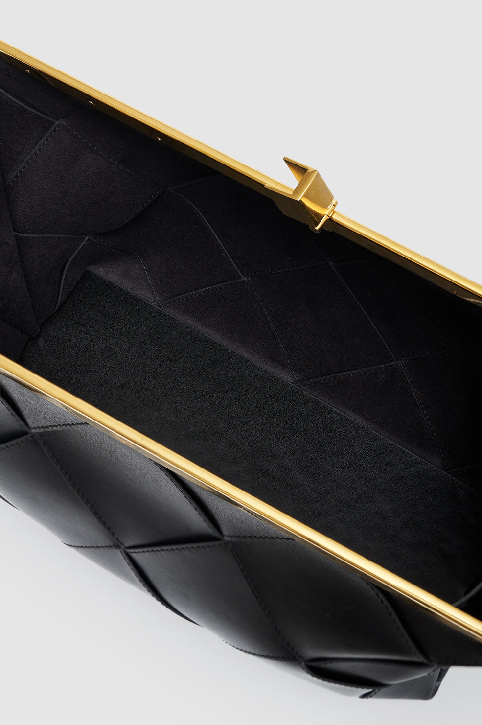 ANINE CLUTCH BRAIDED LEATHER IN BLACK