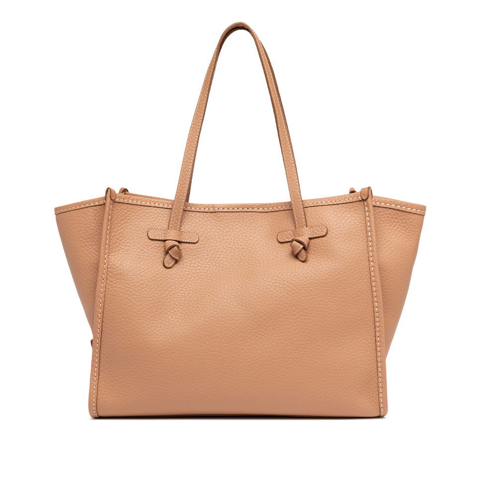 Tan handbag with a white background