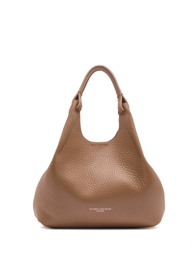 Brown leather handbag with matching strap on a white background