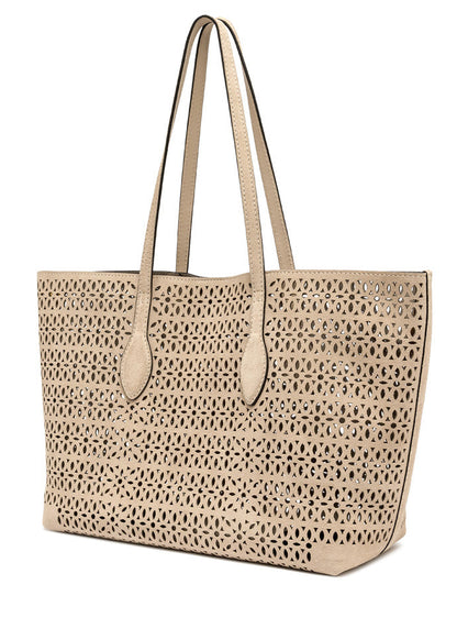 Beige perforated tote bag with leather handles on a white background