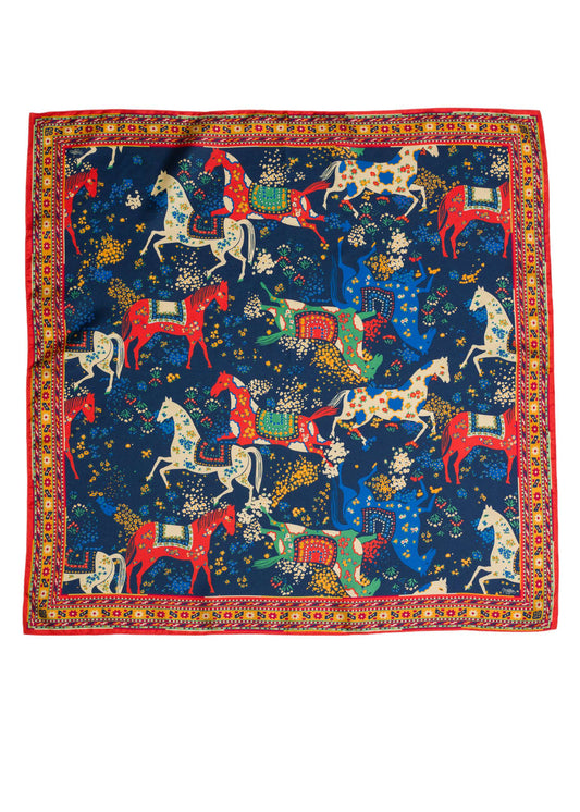 Decorative scarf with horse and cart pattern on a blue background