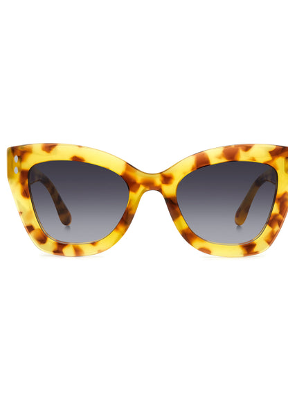 Sunglasses with tortoiseshell frame and dark lenses on a white background