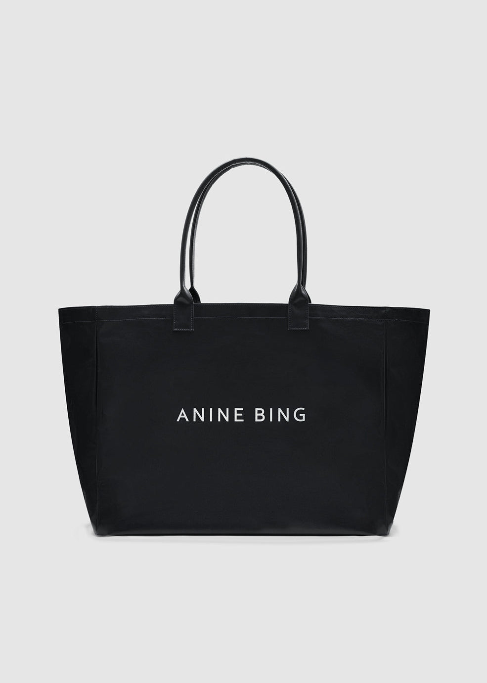 ANINE BING Leo Coated Canvas Tote In Black - image 1