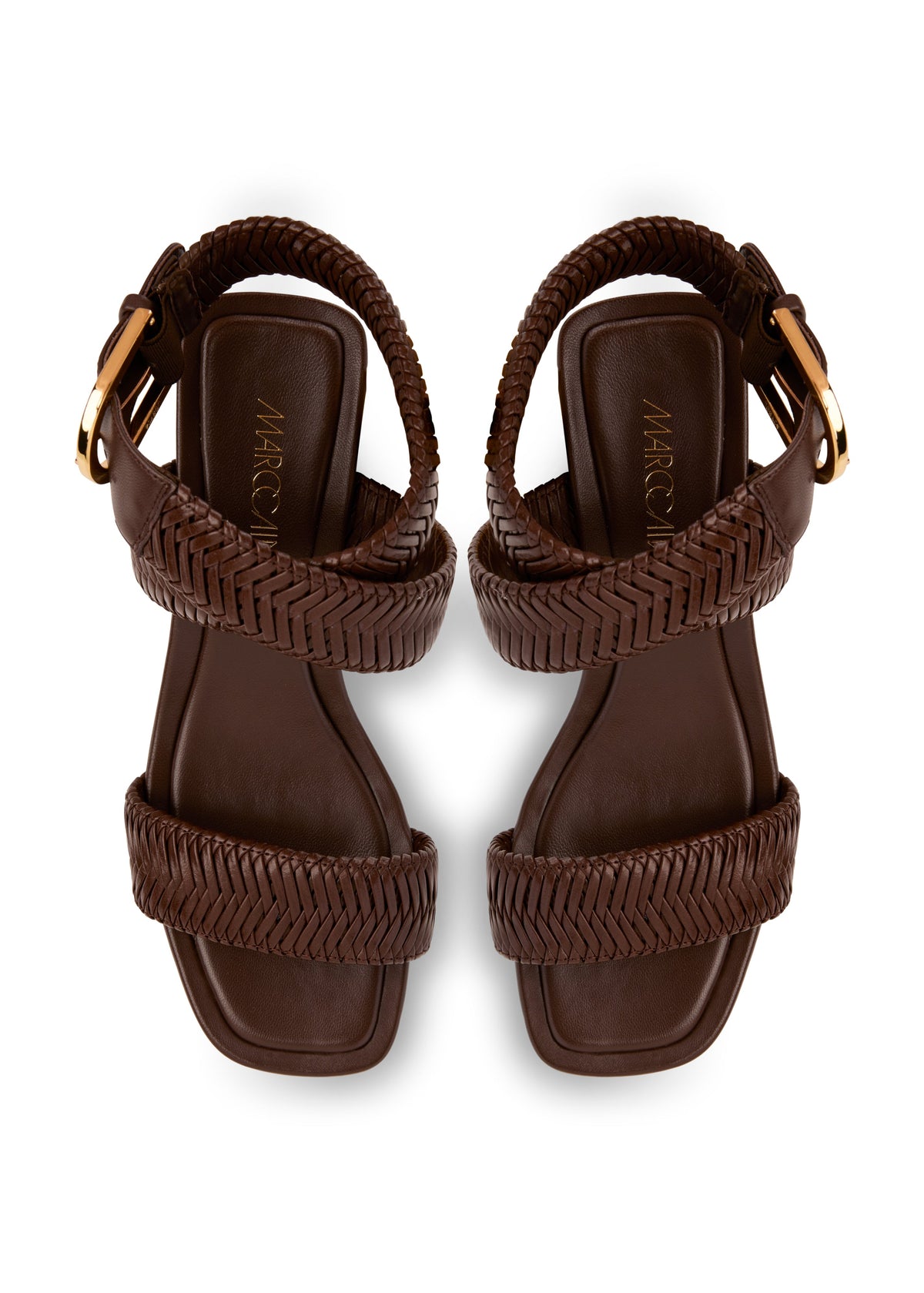 Pair of brown sandals with braided straps on a white background