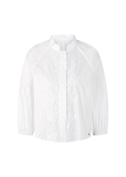 White lace blouse on a white background