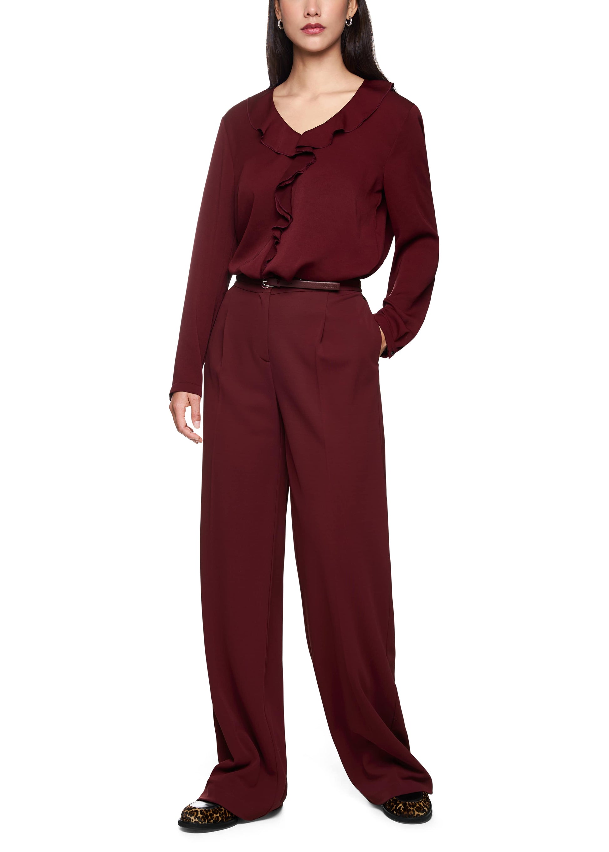 Maroon outfit with a top and pants on a white background