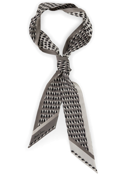 Patterned scarf tied in a knot on a white background