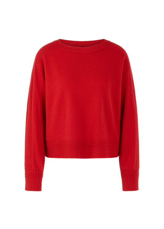 Red sweater on a white background