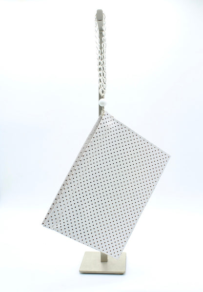 THE CLUTCH LEATHER CLUTCH WHITE W DOTS LASER CUT