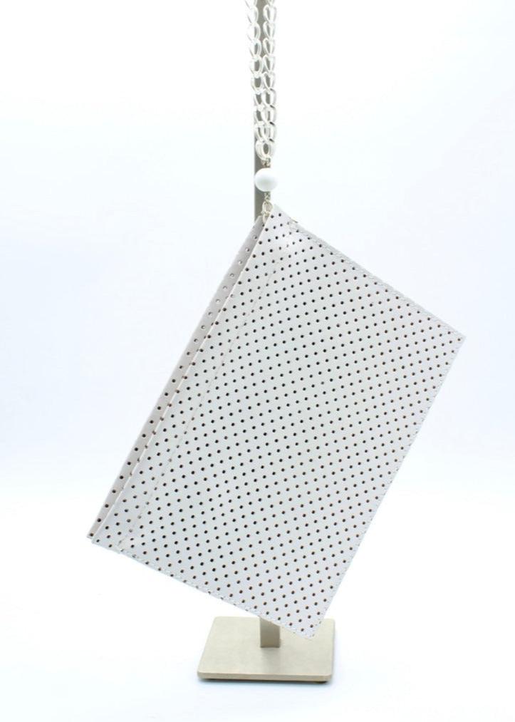 THE CLUTCH LEATHER CLUTCH WHITE W DOTS LASER CUT