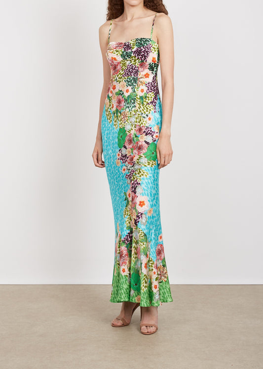 Woman wearing a floral dress with a white background