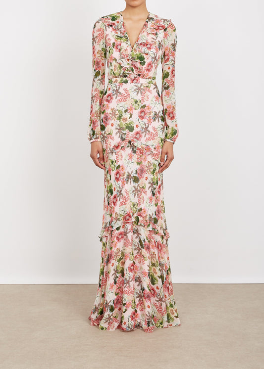 Floral dress with long sleeves on a plain background