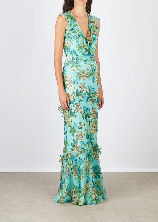 Woman wearing a floral dress with a white background