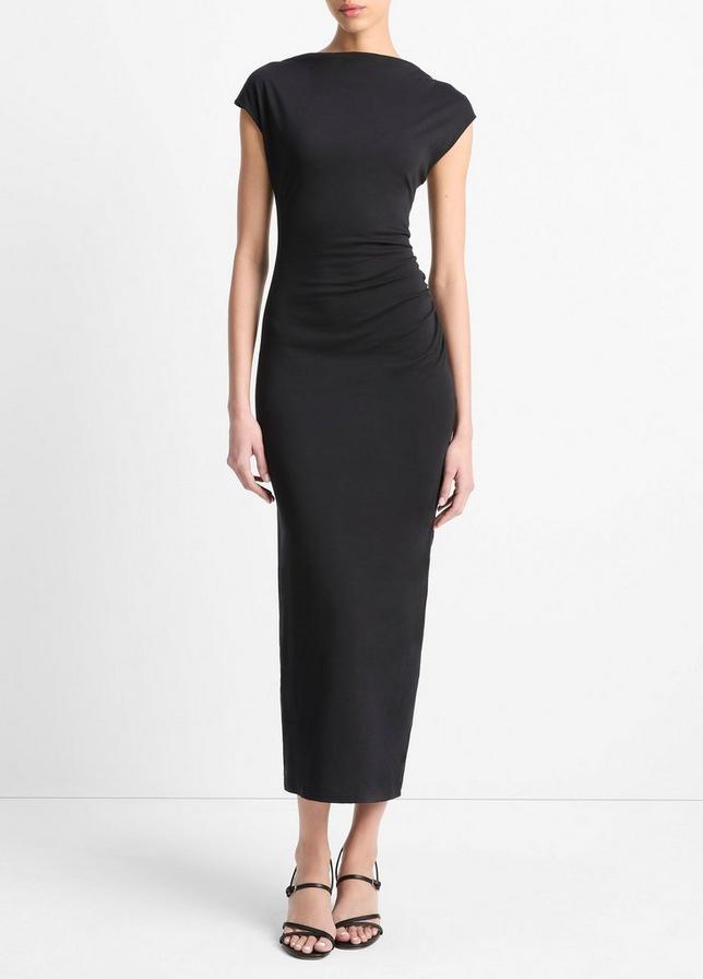 Black dress worn by a model on a white background