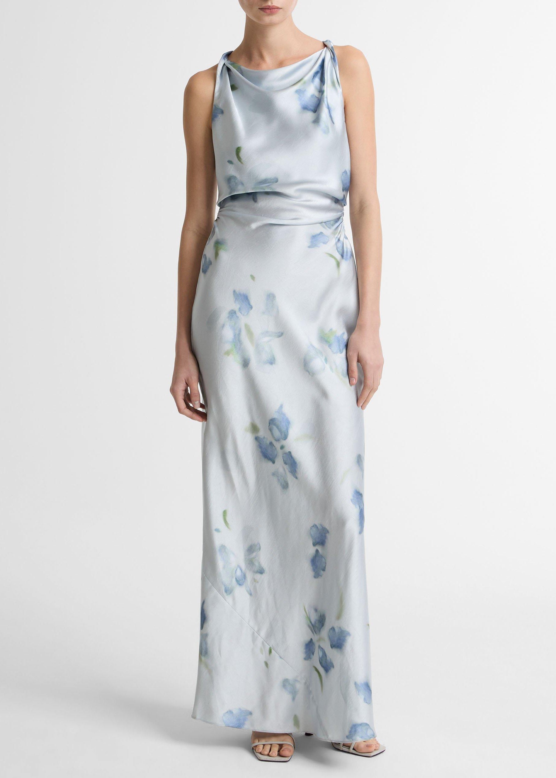 Woman wearing a floral dress on a white background