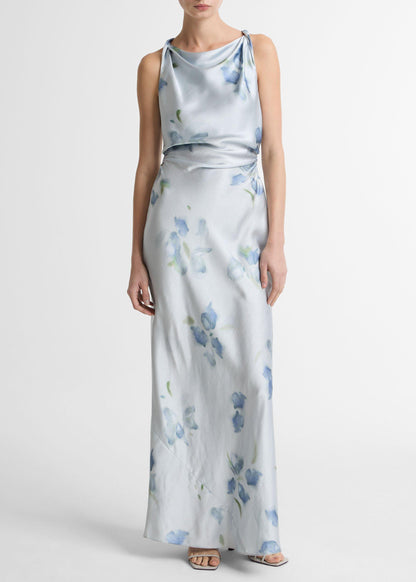 Woman wearing a floral dress on a white background