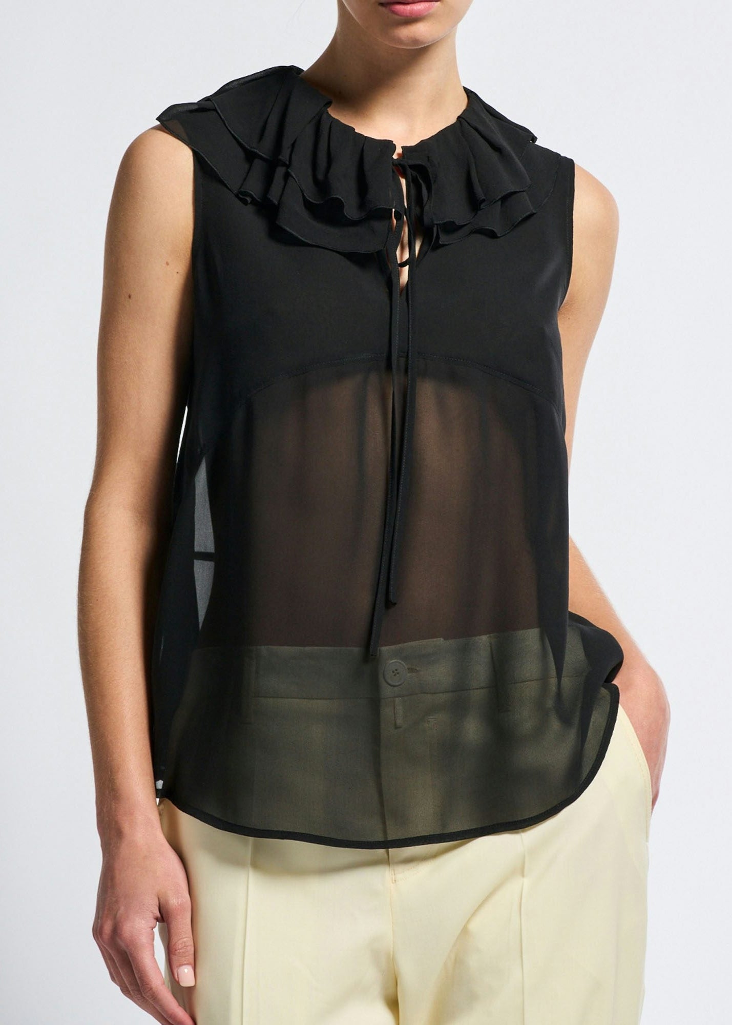 PEEP SLEEVELESS TOP W RUFFLE COLLAR
