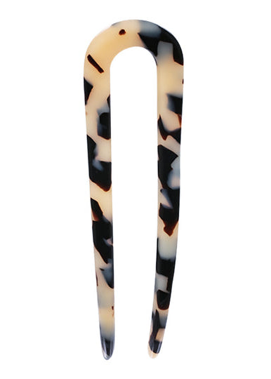 Tortoiseshell hair clip on a white background