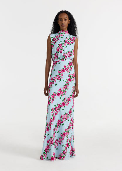 Woman wearing a floral dress on a white background