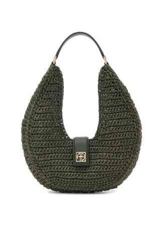 Green woven handbag with a visible brand logo on a white background